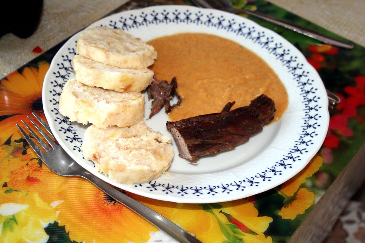 Svíčková, a Czech beef dish with dumplings