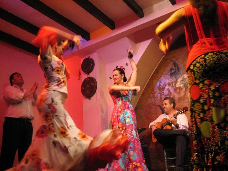 A flamenco dancer performing in Seville