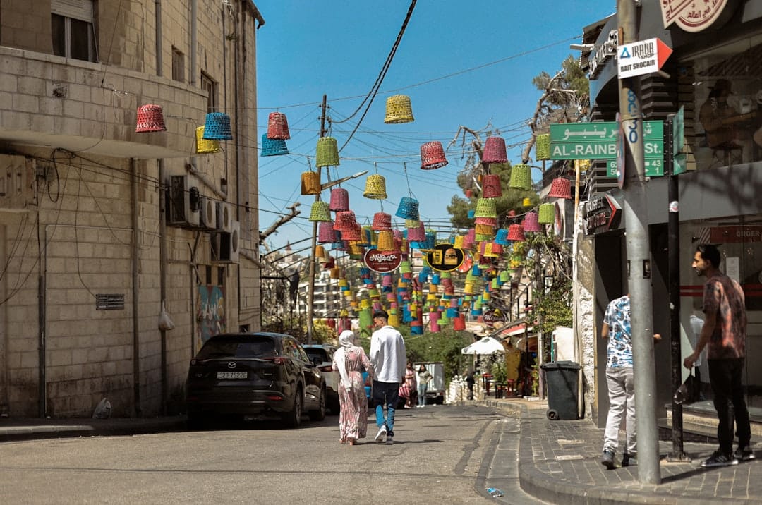 Coloured umbrellas strung over a lane at Paris Circle in Jabal Al-Weibdeh, Amman