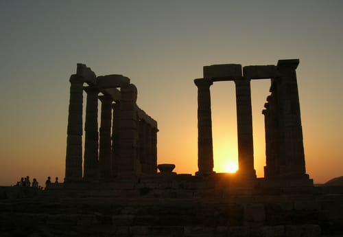 The Temple of Poseidon at Cape Sounion at sunset near Athens