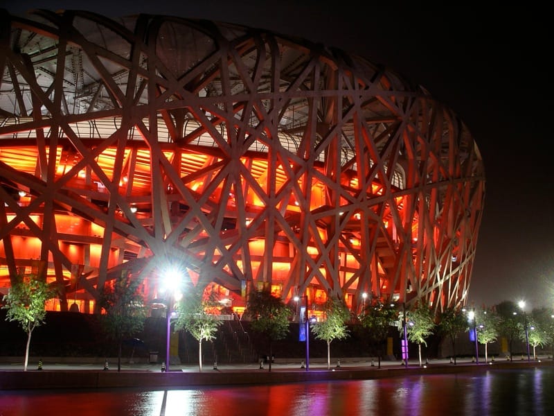 The Bird's Nest National Stadium lit up at night in Beijing