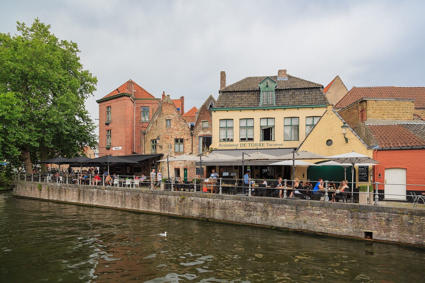 A canal lined with medieval houses in Bruges, Belgium