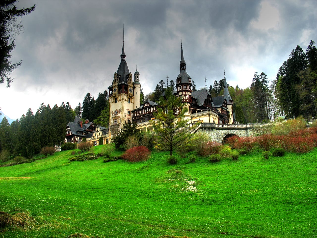 The turreted Peleş Castle in the Carpathian mountains of Romania