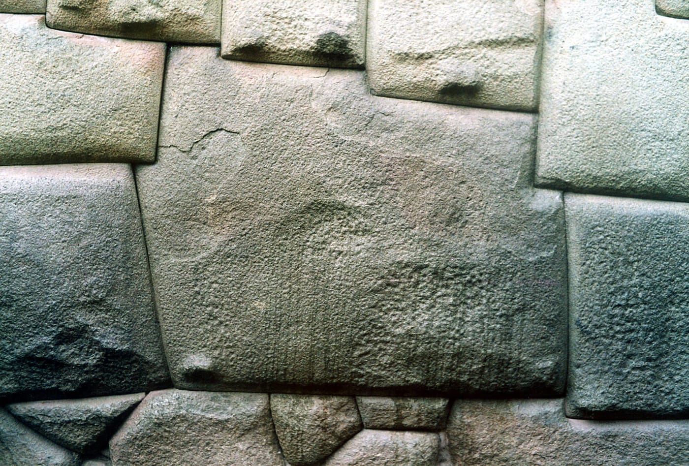 The famous twelve-angled Inca stone in a wall in Cusco