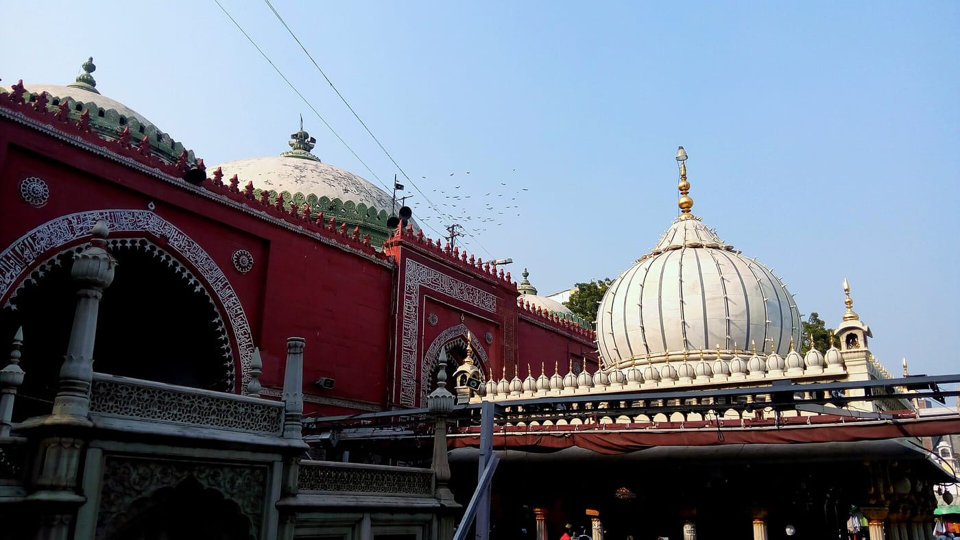 The marble shrine and crowds at the Nizamuddin Dargah in Delhi