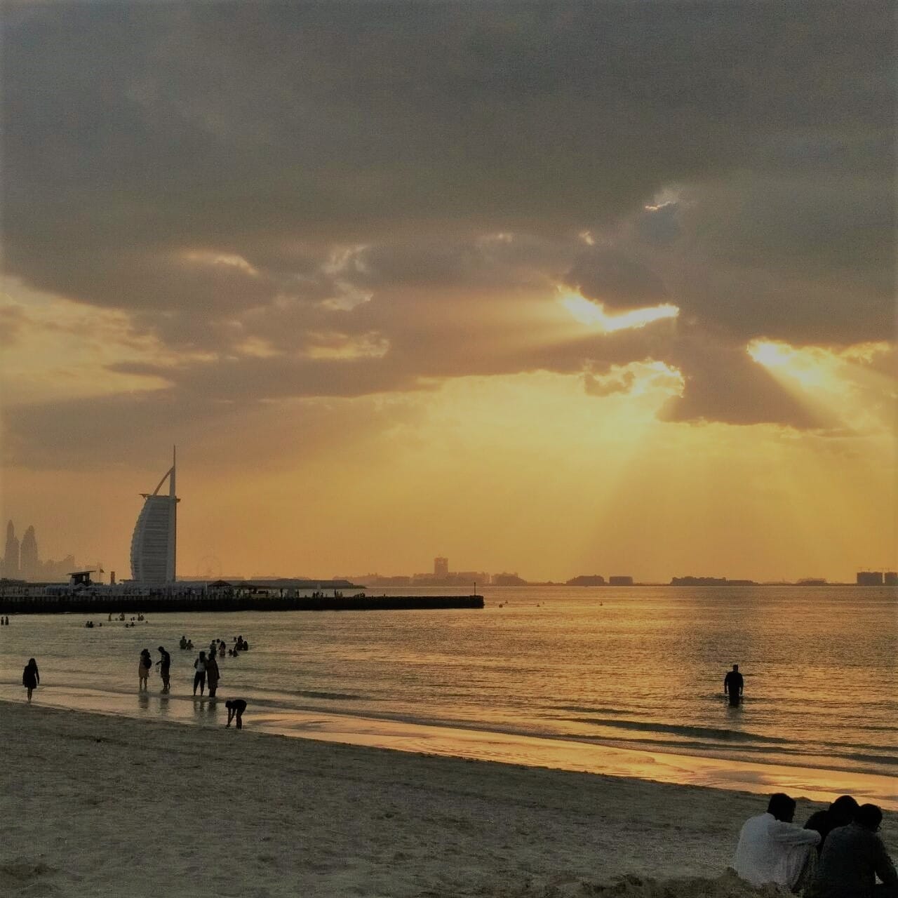 Kite Beach at sunset with the Burj Al Arab in Dubai