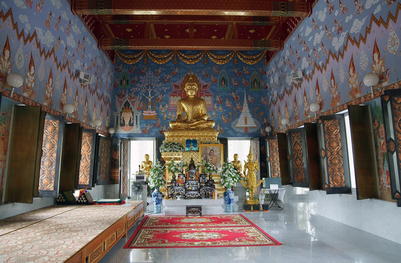 The ornate interior of the Wat Kaew Korawaram temple in Krabi Town
