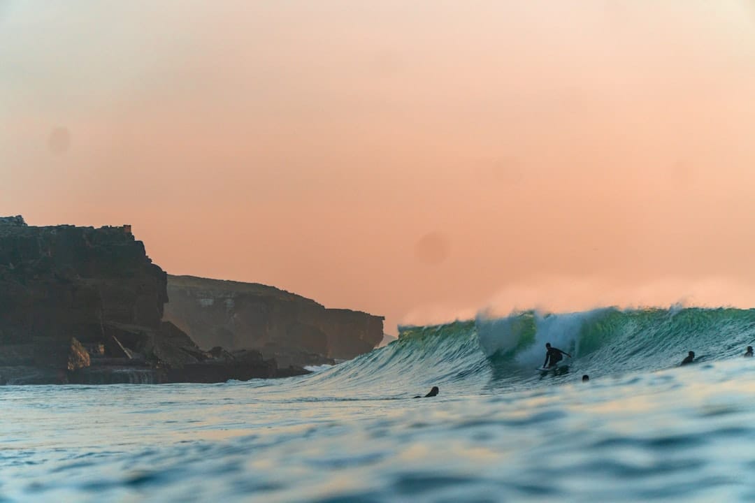 Surfing on the Algarve coast near Lagos