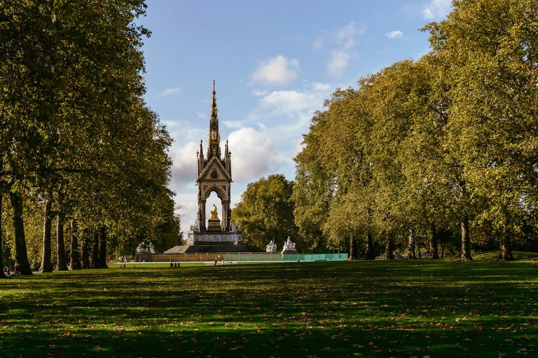 The Albert Memorial among autumn trees in Kensington Gardens, London