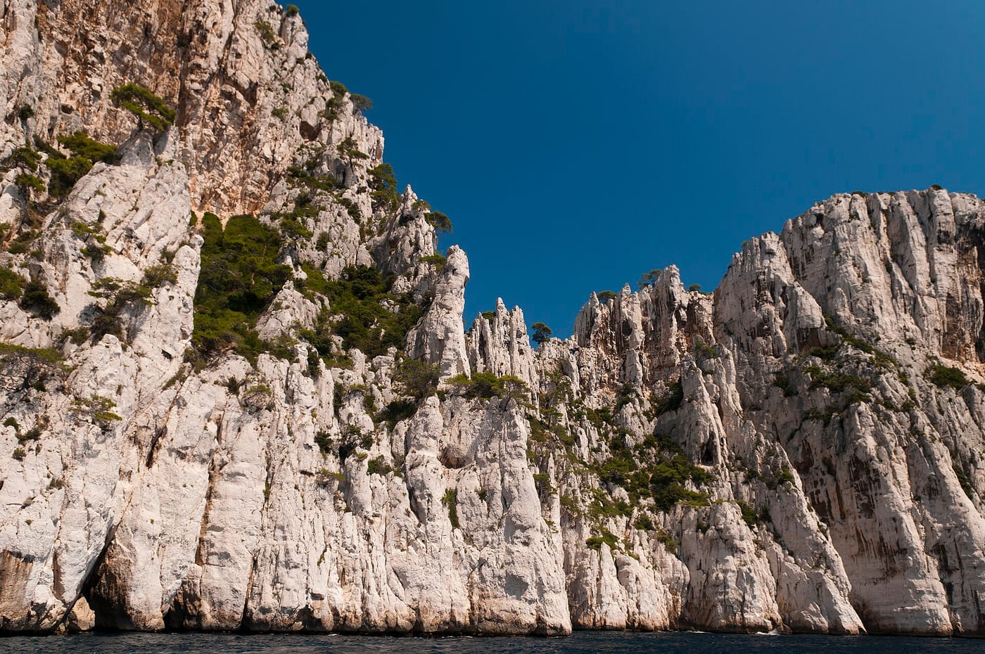 The limestone cliffs and clear water of a calanque near Cassis