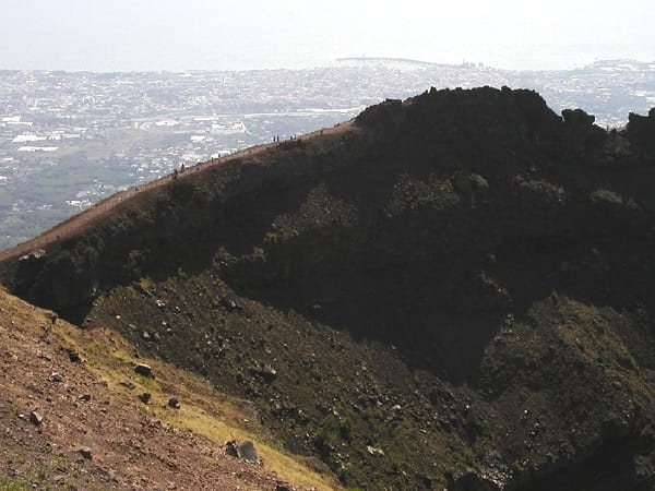 The crater rim of Mount Vesuvius above the Bay of Naples