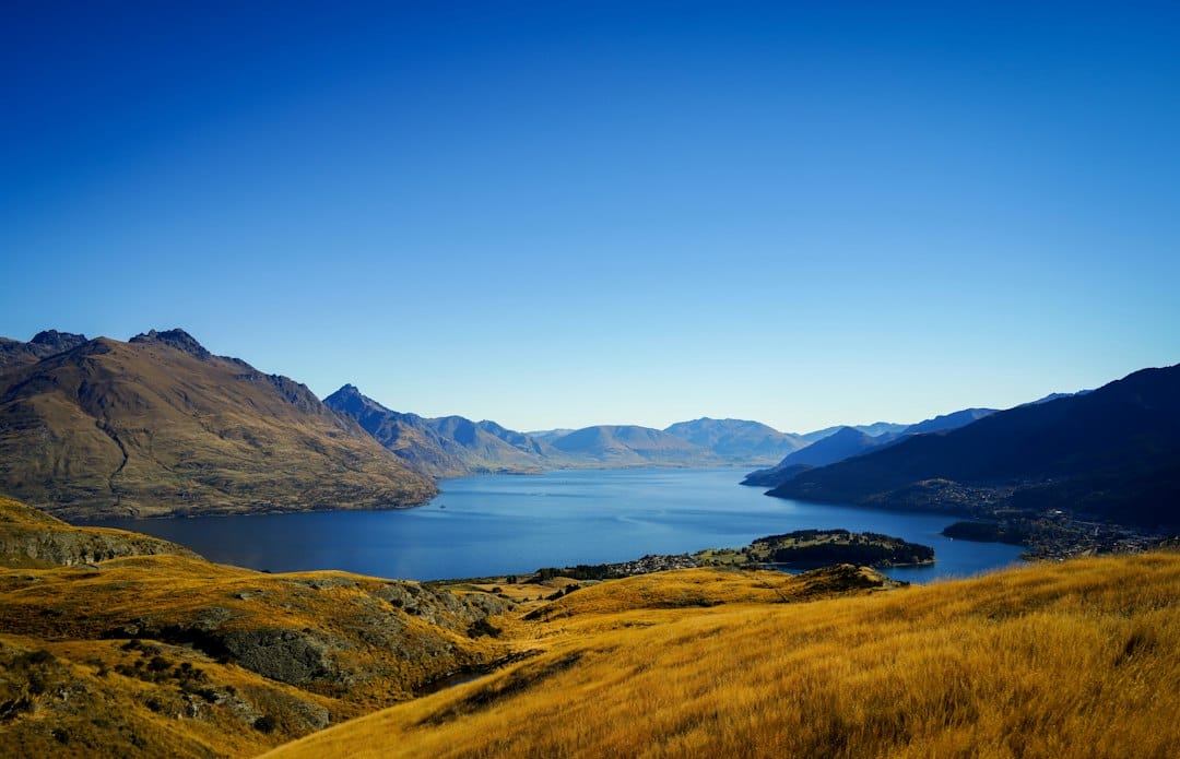 The turquoise water and mountains of Bob's Cove on Lake Wakatipu