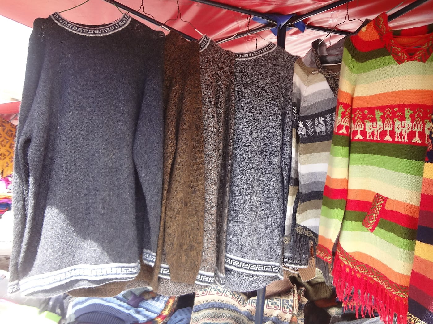 Colourful textiles at the indigenous Otavalo market in Ecuador