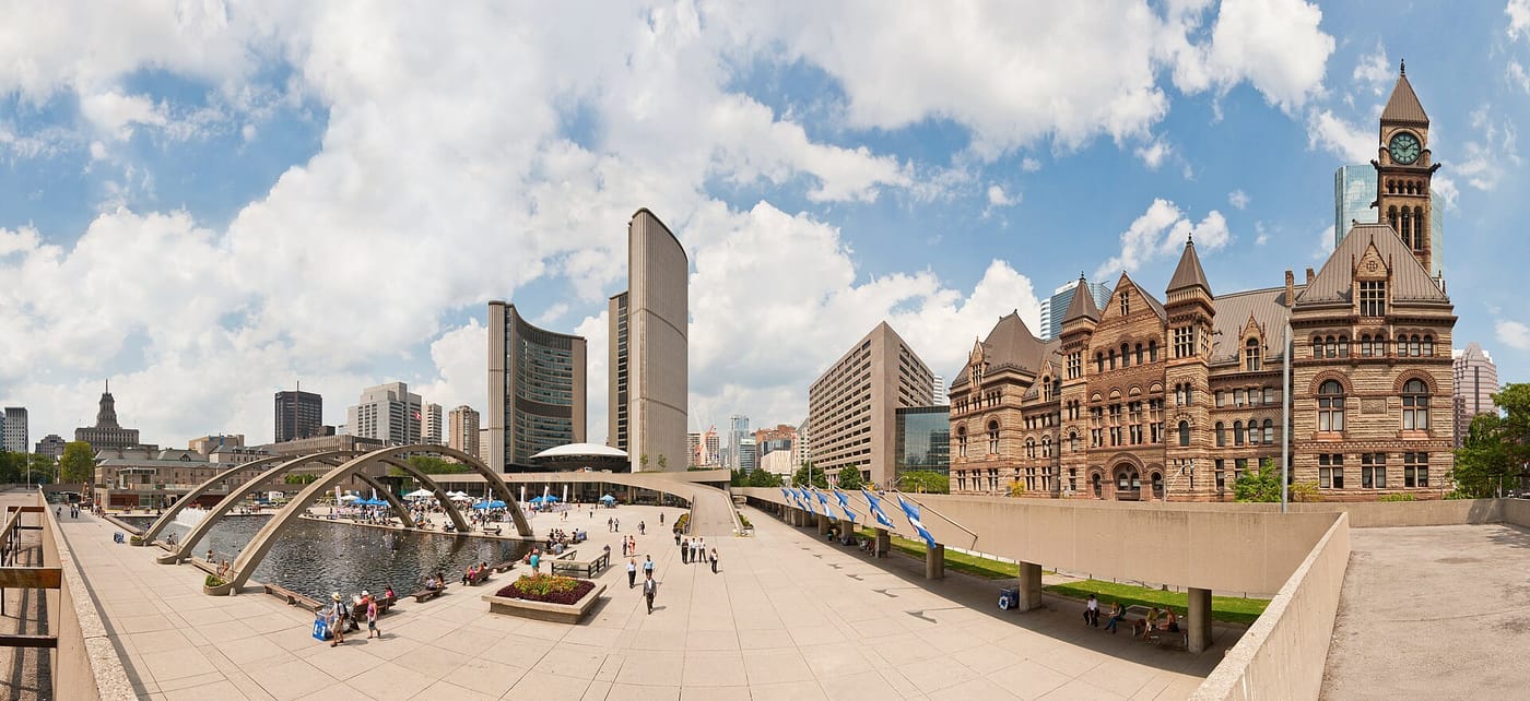 The curved City Hall and 'TORONTO' sign at Nathan Phillips Square