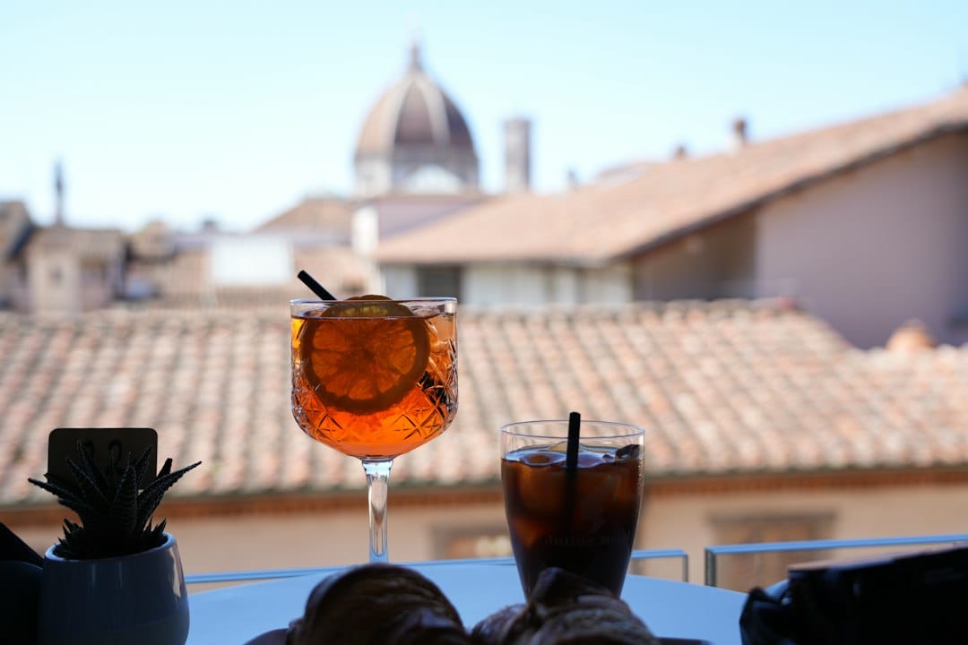 An Aperol spritz aperitivo on a Verona square